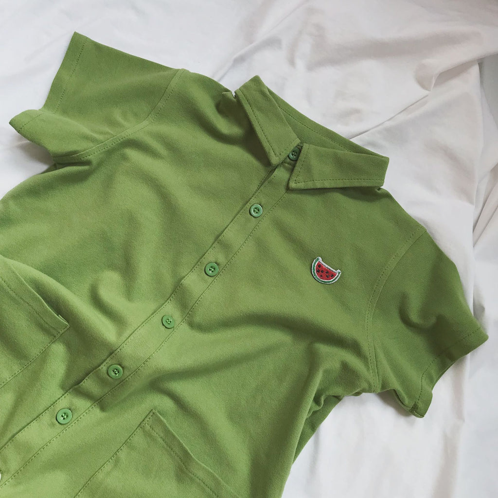 Children's jumpsuit with short sleeves and polo pockets