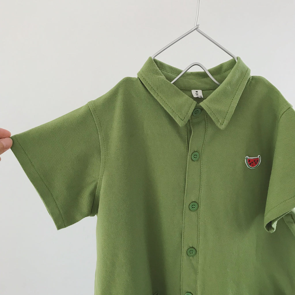 Children's jumpsuit with short sleeves and polo pockets